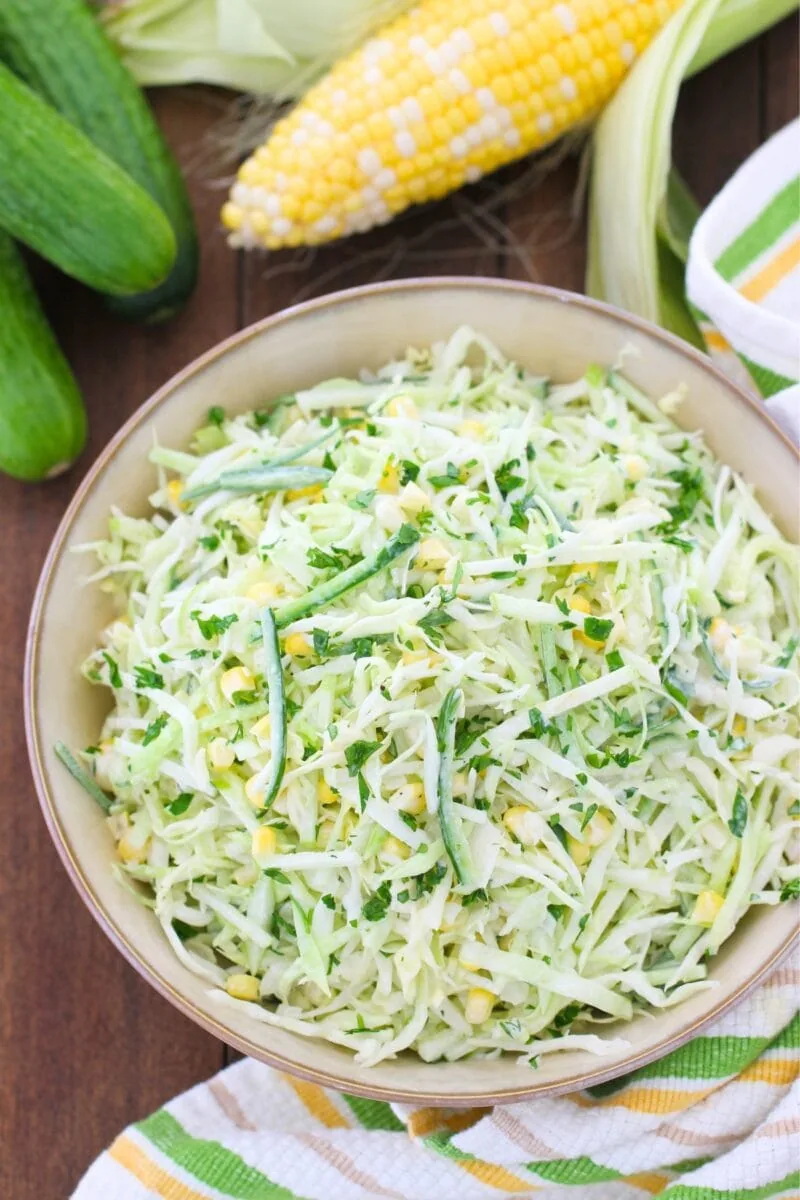 Cabbage Cucumber Salad with apples, corn and fresh herbs