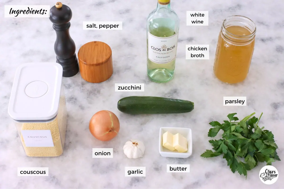 Ingredients for Zuchinni Couscous on a marble countertop. 