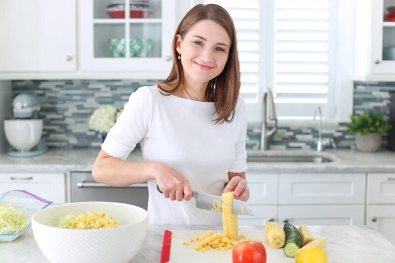 Olga prepping Cabbage Cucumber Salad Meal prep