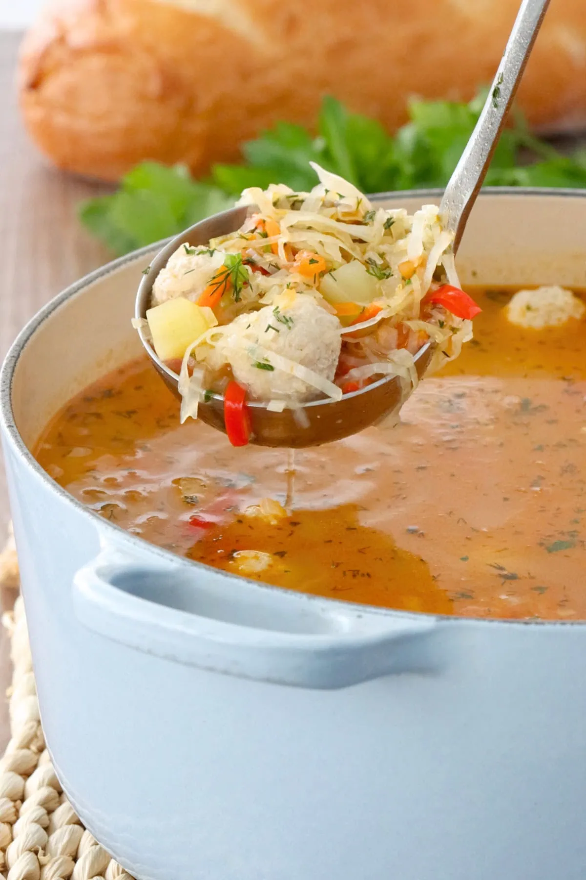 Cabbage Meatball Soup (ladle in the soup pot)