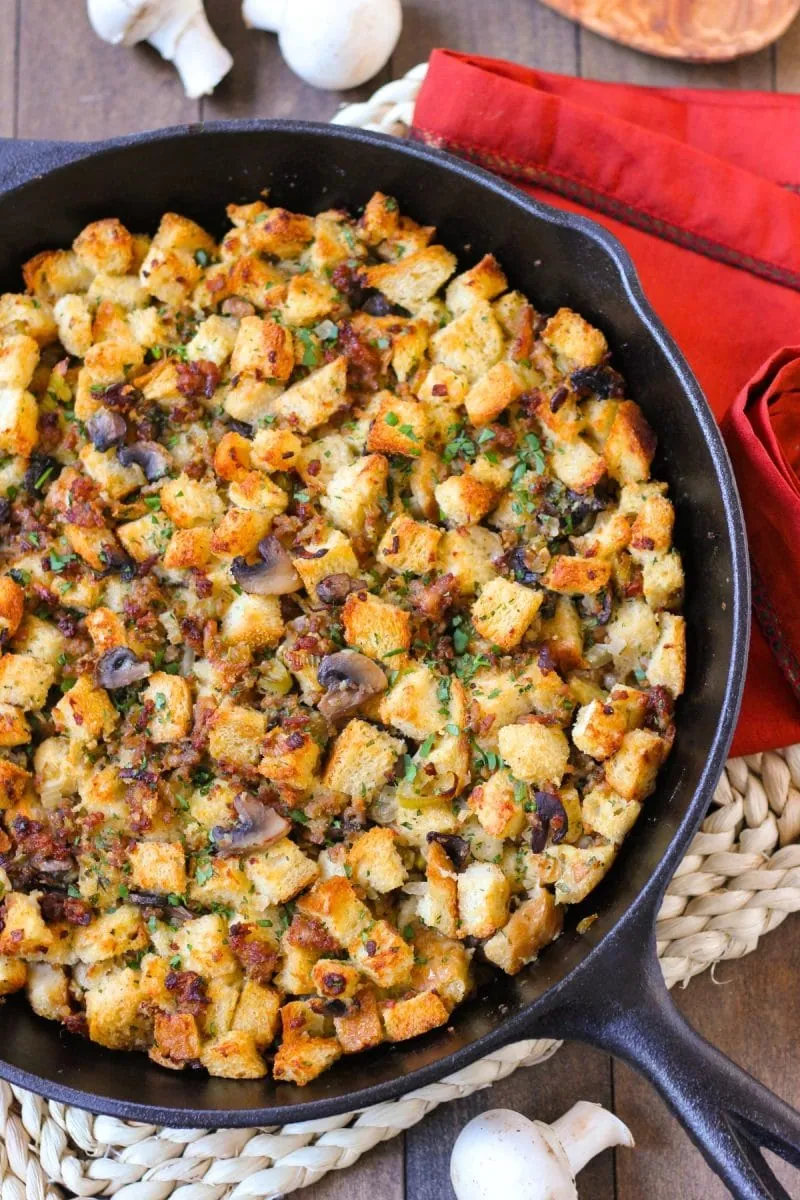 Mushroom Sausage Stuffing made with sourdough bread in a cast iron skillet. 