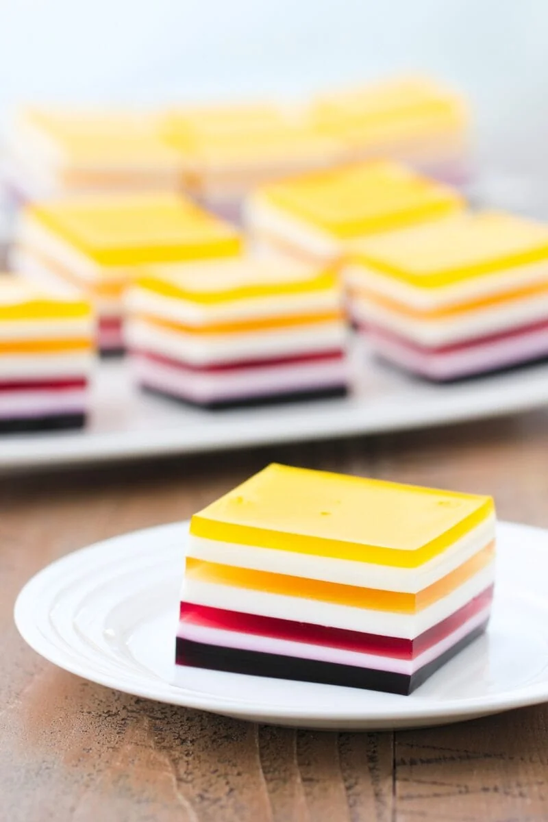 Layered Rainbow Jello cut into slices