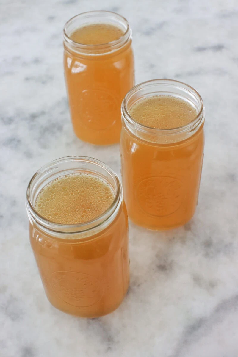 Chicken broth or chicken stock in mason jars